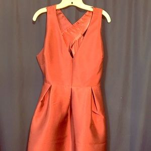 Rust colored cocktail dress with pockets. New!